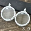 0 silver, double-sided, with gem