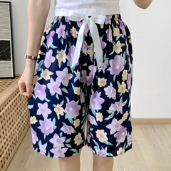 綿のシルクのパジャマの女性の夏の薄いサイズのゆったりした人造綿の濃厚なビーチのズボンは家のズボンの砕花の中のズボンを着ることができます。