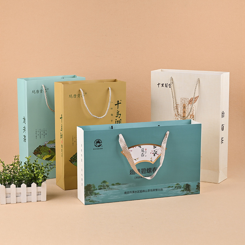 新款牛皮纸袋手提礼品购物茶叶袋白卡纸广告宣传收纳纸袋定 制