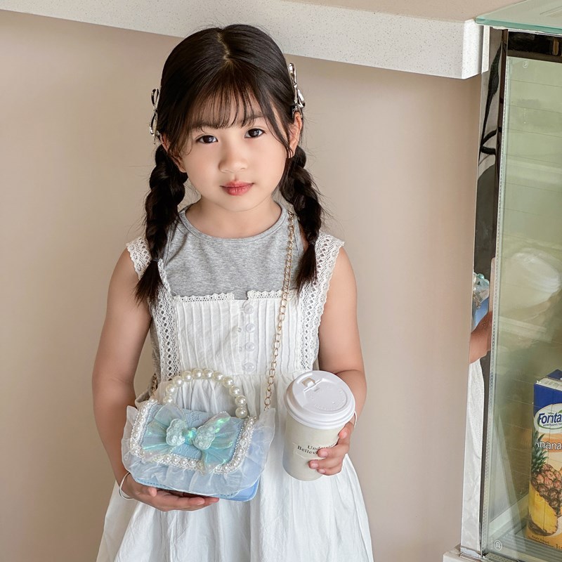 Estilo occidental princesa bandolera moda pequeña fragancia bowknot bandolera para niños y niñas nueva cadena mini bolso para niños