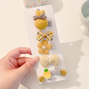 Hermosos clips de cabello de color para niños coreanos de alto nivel sensación de arco de niñas bolsa de tela no daña clips de cabello de bebé