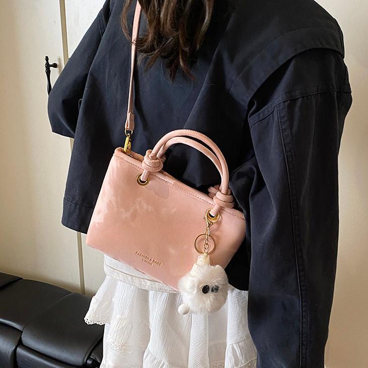 Bolso de mano casual simple coreano para damas 2025 nuevo estilo de transporte universal bolso de cubo popular mochila de hombro