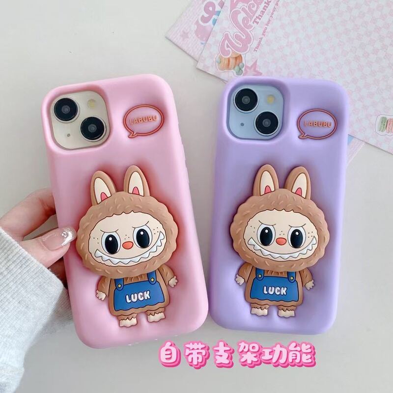 漫画風のかわいいラブブ付きスタンド付きスマホケース、Apple iPhone16/15/13/14対応、シリコン製、滑り止め|undefined