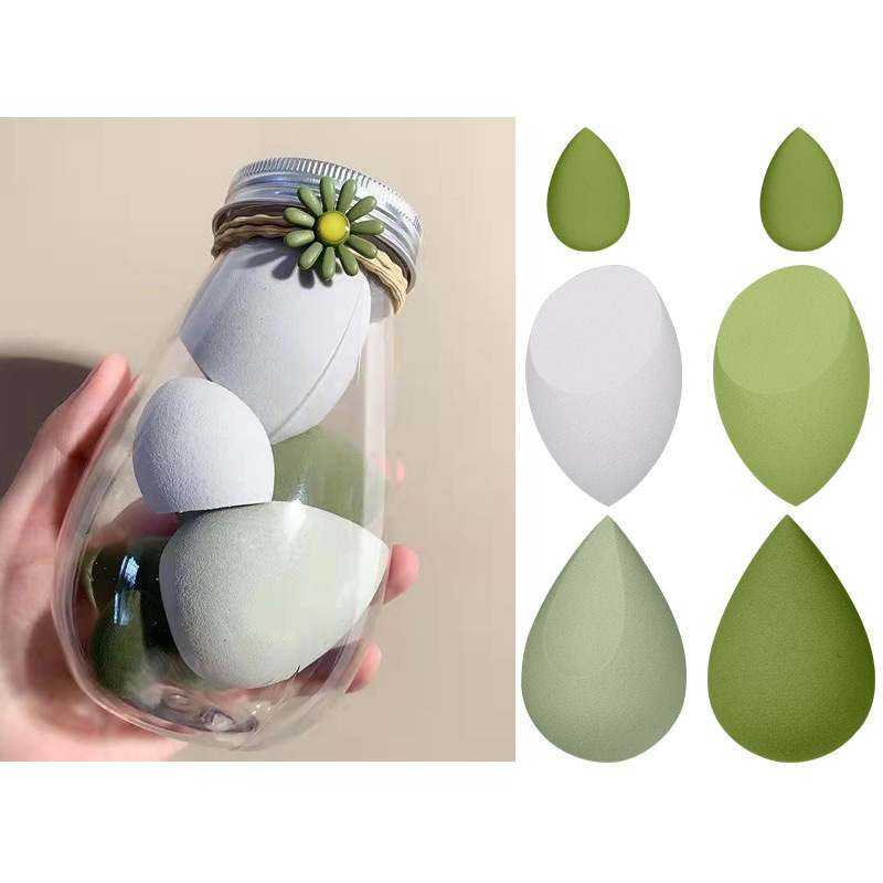 Paquete de viaje portátil soplo de polvo botella de PET huevo de belleza botella súper suave actualización esponja soplo de polvo té con leche color enlatado