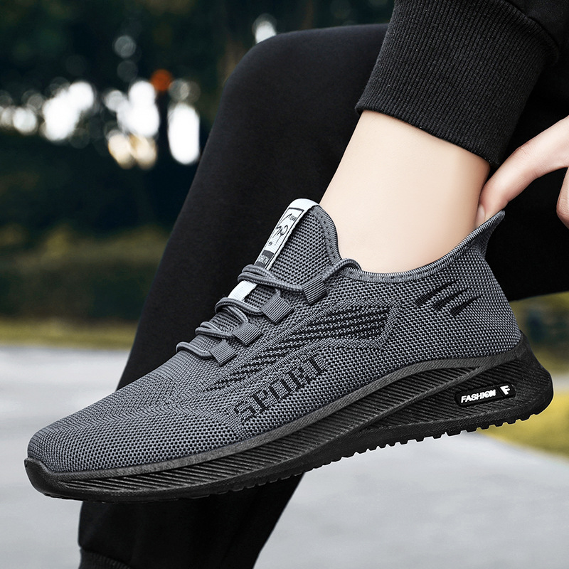 Flyknit 2024 nueva primavera y otoño zapatos transfronterizos de los hombres Zapatos para caminar casual transpirable deportes Comercio exterior al por mayor