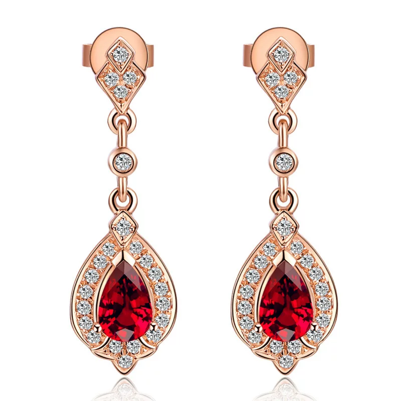 Серьги каплевидной формы, с камнем