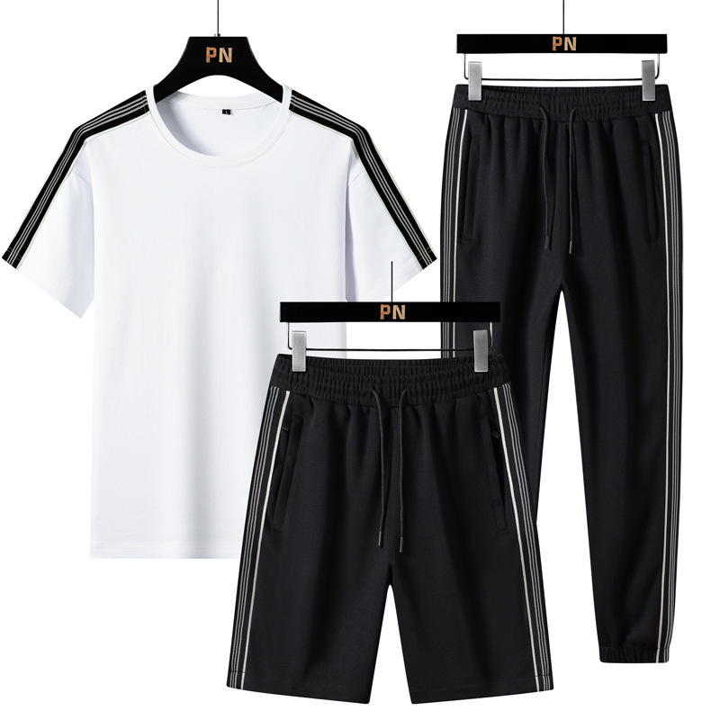 Verano nuevo estilo suelto tendencia hombre estilo Hong Kong camiseta de manga corta deporte de dos piezas marca de moda traje casual hombres y mujeres