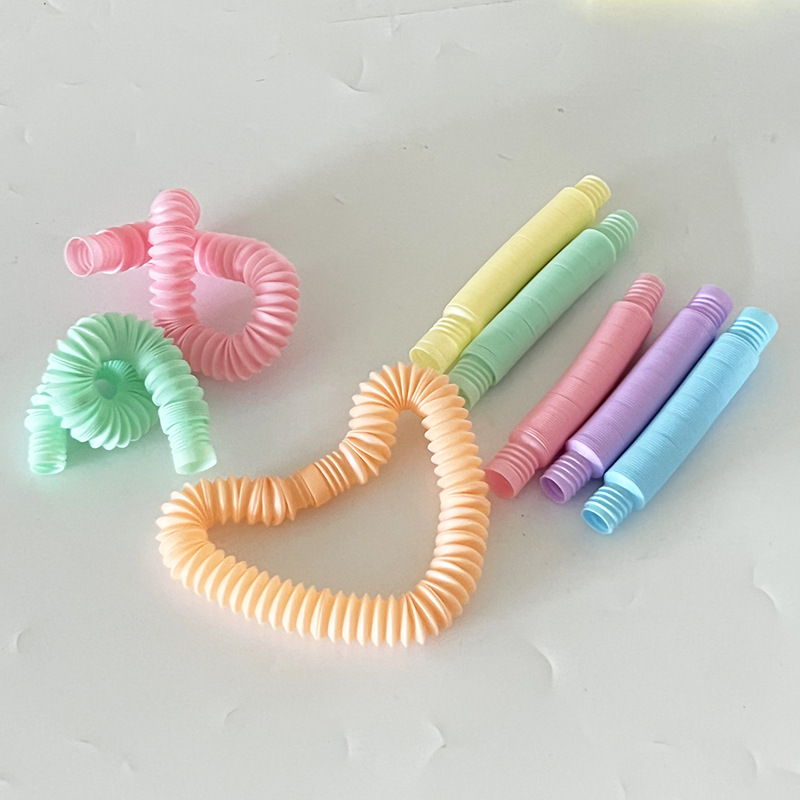 Transfronteriza descompresión juguete pop tubo niños adultos corrugado DIY estiramiento tubo macaron color estiramiento tubo de plástico