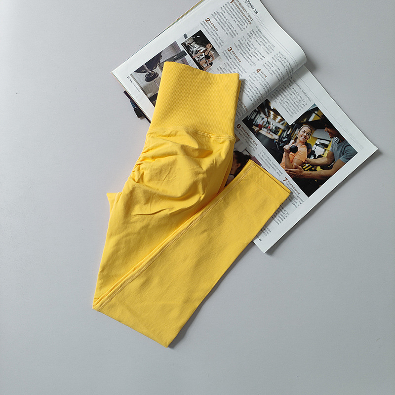 Pantalones de gimnasio sin costura europeos y estadounidenses, cintura alta, abdomen, caderas, pantalones de melocotón para correr, yoga, leggings apretadas