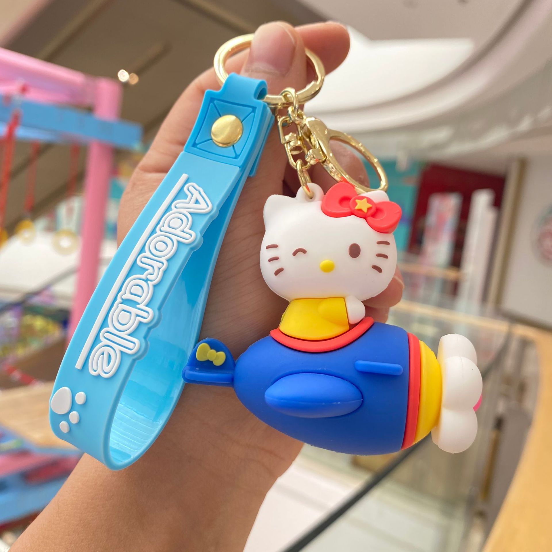 Creativo de dibujos animados Sanrio giratoria dulce avión llavero coolomi muñeca llavero pequeño regalo al por mayor