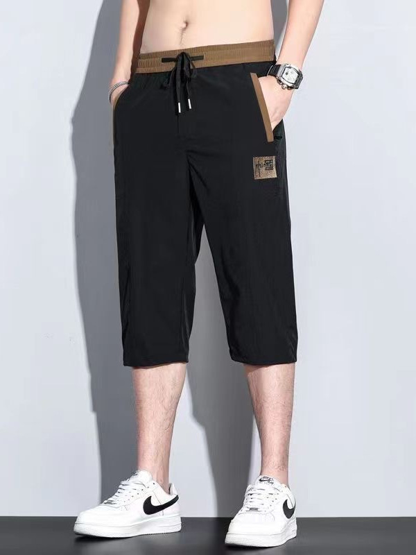Pantalones cortos de siete puntos para hombres de verano delgados sueltos de moda versátil pantalones casuales bordados con cremallera anti-robo pantalones rápidos de moda para hombres