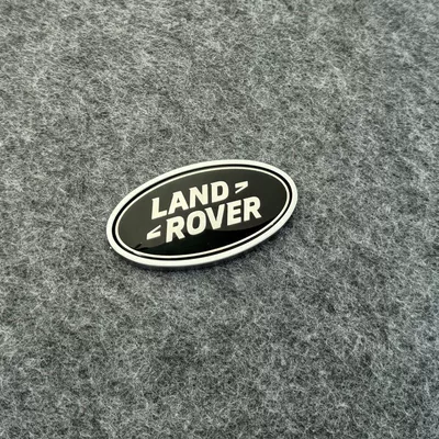 Car logo Evoque, Velar, and Range Rover Sport - standard-lr-tail-mark-black