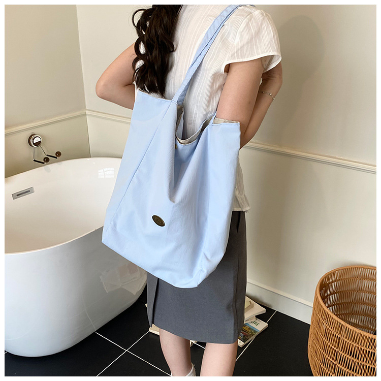 ins Korean-style laid-back single-shoulder bag, casual large-capacity black and white checkered tote bag, student commuting backpack for classes undefined