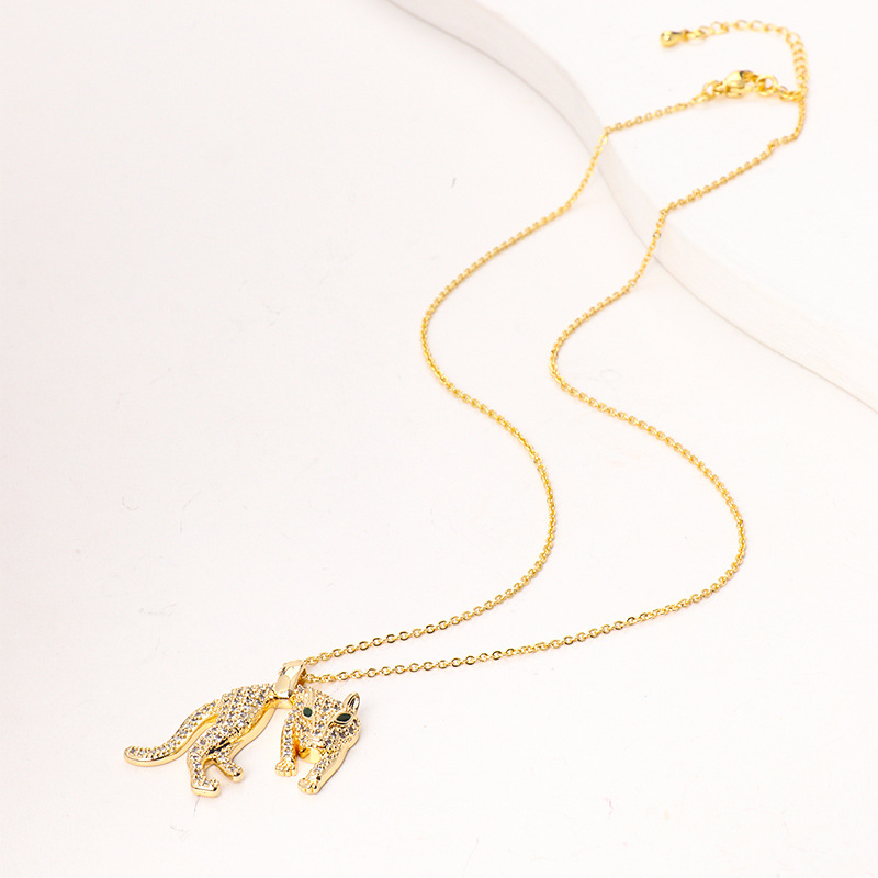 Nouveau collier polyvalent personnalisé hip-hop avec pendentif léopard en zircon et diamants, plaqué cuivre, véritable or transfrontalier, style hip-hop_voghion.com
