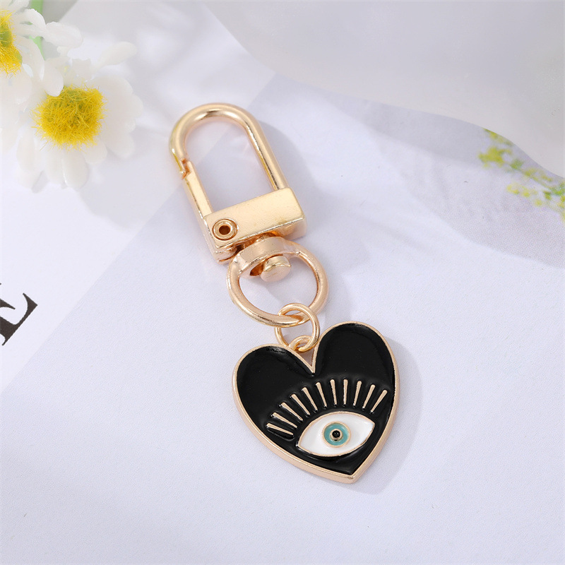 Cute Rainbow Heart Shape Eye Alloy Enamel Inlay Rhinestones Women's Keychain 1 Piece display picture 9