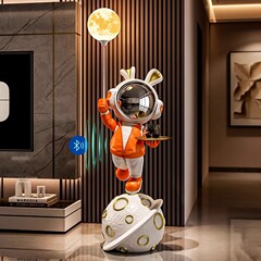 軽豪華宇宙飛行士の宇宙飛行士のウサギが着地してテレビの棚のソファーの大型の装飾品を飾って新居のプレゼントに移ります。