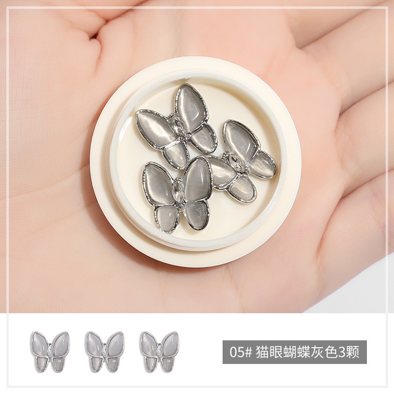 Online popular hielo transparente Aurora mariposa joyería cristal blanco piedra tridimensional uñas diamante Super Flash rhinestone uñas joyería