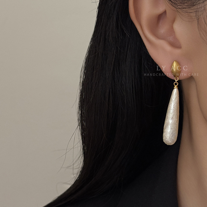 Nuevo estilo chino retro atmósfera cálida y suave nuevo estilo de moda aretes de aretes de borda vestido de algodón perlas largas aretes de aretes de arete de arete de arete