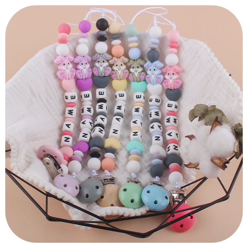 El Comercio exterior nueva cadena de chupete de conejo de silicona suministros para bebés personalizable nombre del bebé cadena anti-caída