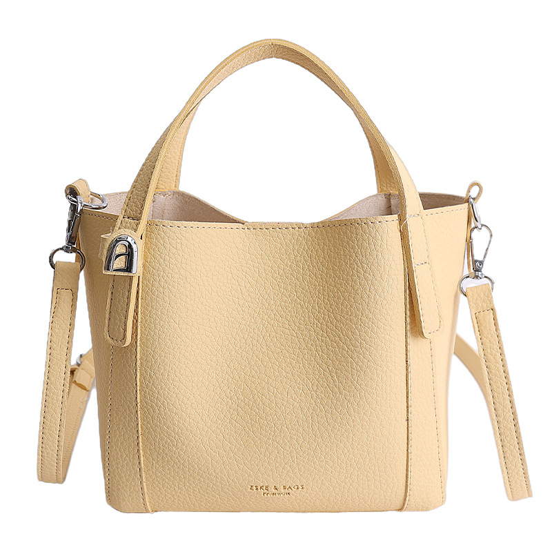 Nicho coreano litchi pattern bolso de cubo de mano mujer comercio exterior nueva moda alta textura ligera lujosa bolsa de mochila