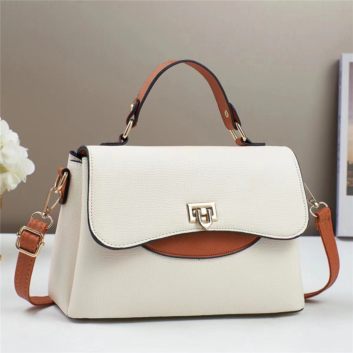 Fabricantes coreanos nuevos bolsos de comercio exterior mujeres texturas de hombro, bolsos inclinados para mujeres 2025 bolsos de mano de moda