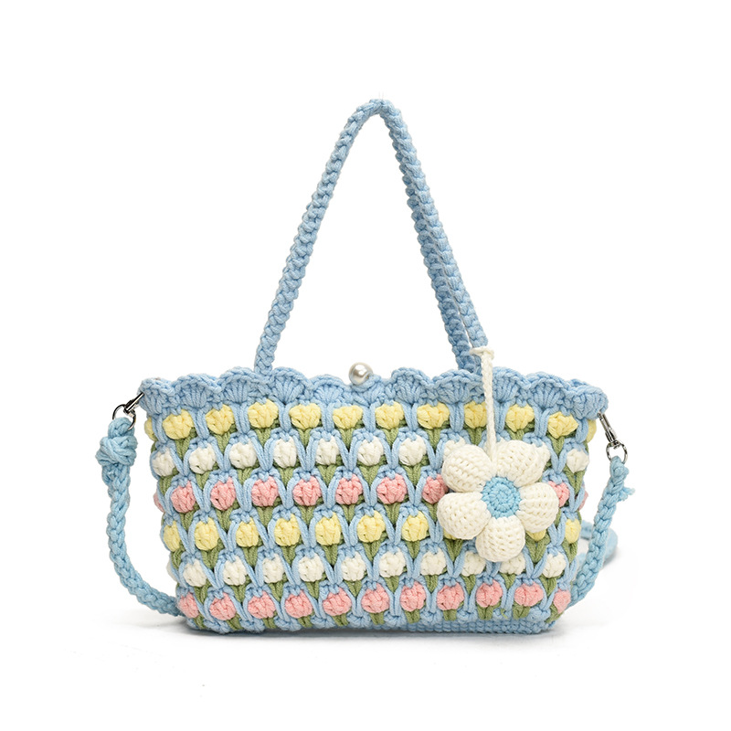 Nuevo paquete infantil transfronterizo ganchillo hecho a mano flores dulces bolsas de hombro para hombres y mujeres viajes de vacaciones bolsas de cestas de verduras portátiles