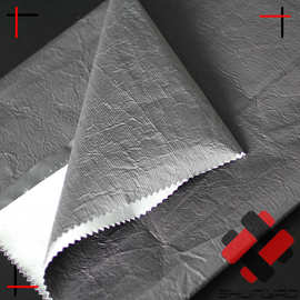 舜尧 特卫强杜邦纸皱纹感复合面料 纸感硬挺有光风衣布料