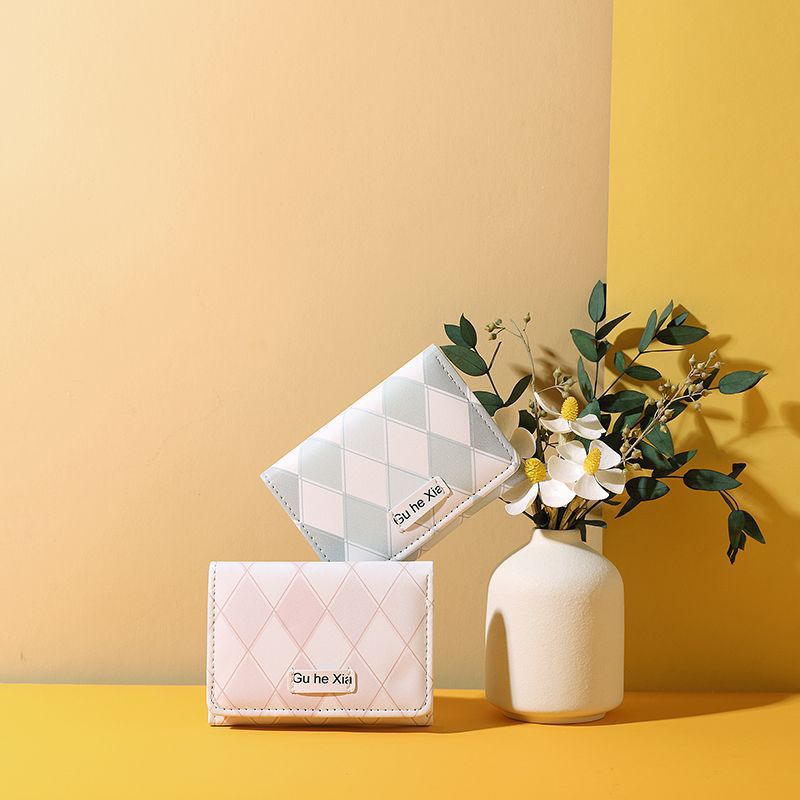 Cross-border popular women's short wallet with niche design, exquisite tri-fold anti-magnetic card holder, small wallet in one piece.