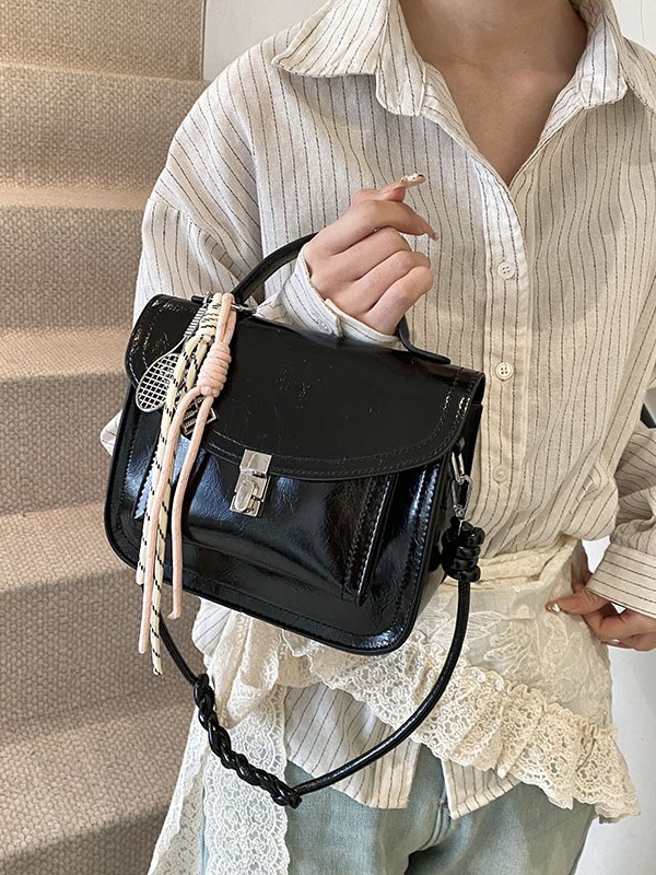 Bolso de mano retro coreano para mujeres 2025, nuevo bolso de cartero universal, simple bolso de mujer de viaje casual.