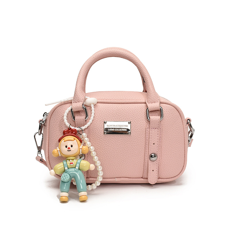 Bolso de bolera de mano de estilo explosivo para mujer 2025 nuevo bolso de hombro de estilo occidental de todo fósforo bolso de mensajero de paso de moda de alta gama