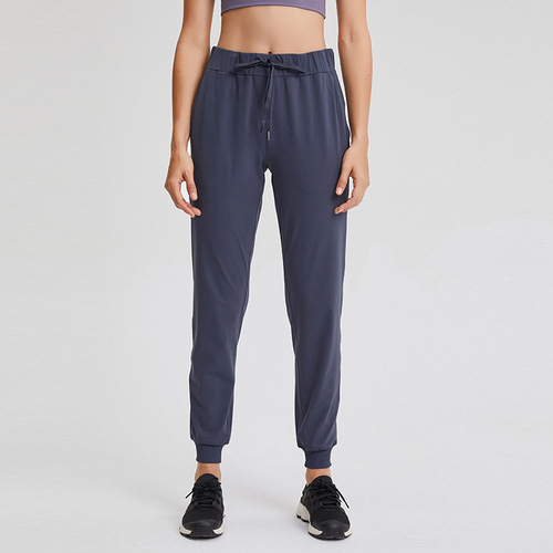 Spring and summer new style elastic waisted yoga pants, simple straight sports and casual elastic leg-tie nine-point pants for women