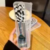 Spoon, fork, chopsticks, box