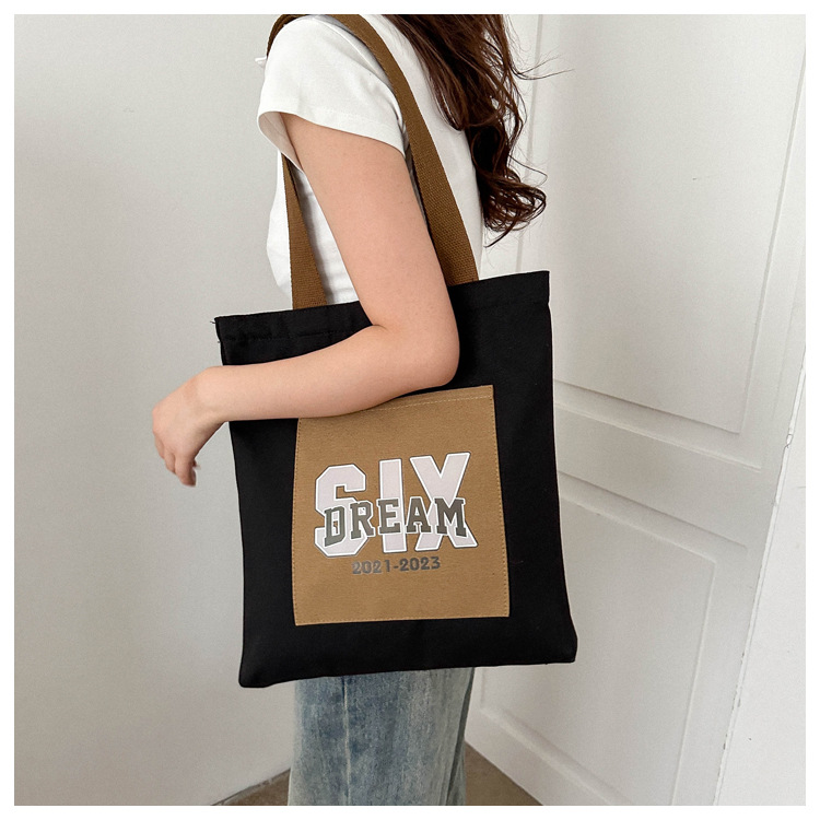 Wholesale of 2025 new casual and fashionable canvas bags, large-capacity single-shoulder bags for college students' shopping, and trendy tote bags undefined