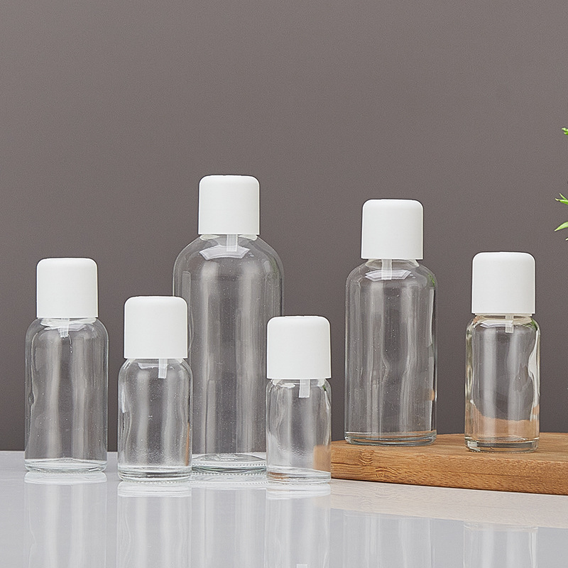 Botella de aceite esencial de vidrio esmerilado transparente a prueba de robo 10 - 100ml botella de emulsión esencia al por mayor