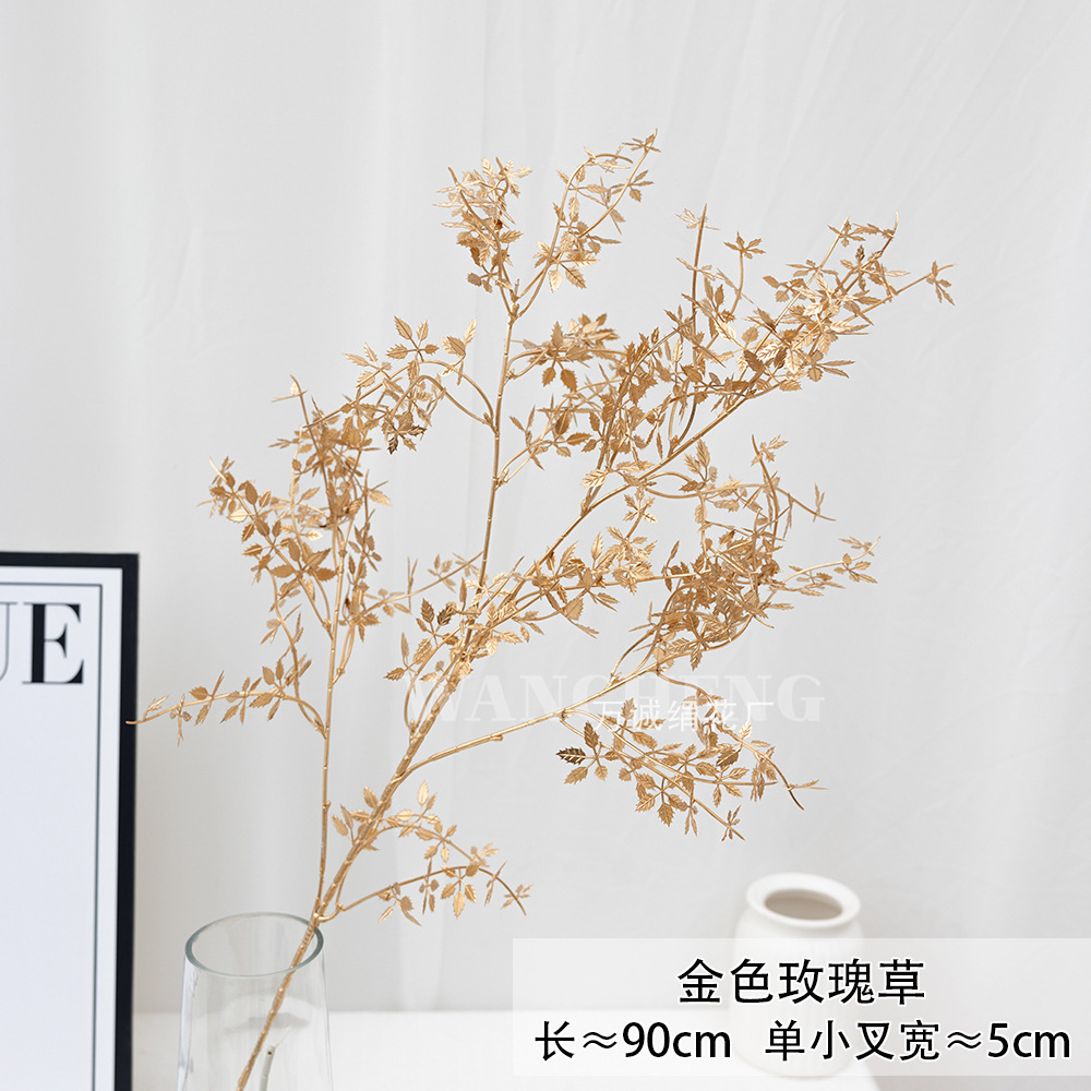 Flores artificiales doradas para Navidad