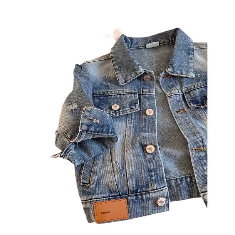 Chaqueta de mezclilla para niños 2025 otoño nuevo estilo niño niña color sólido chaqueta de mezclilla raspada bebé top de todo fósforo