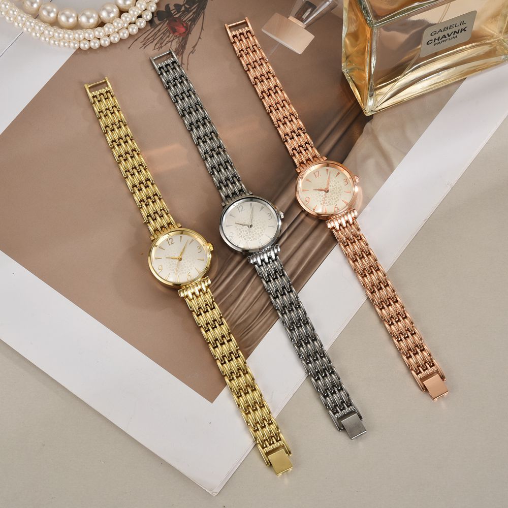 Estilo europeo y americano temperamento casual cinturón de acero cuarzo reloj para mujer moda reloj de aleación de superficie digital pulsera para mujer reloj para mujer