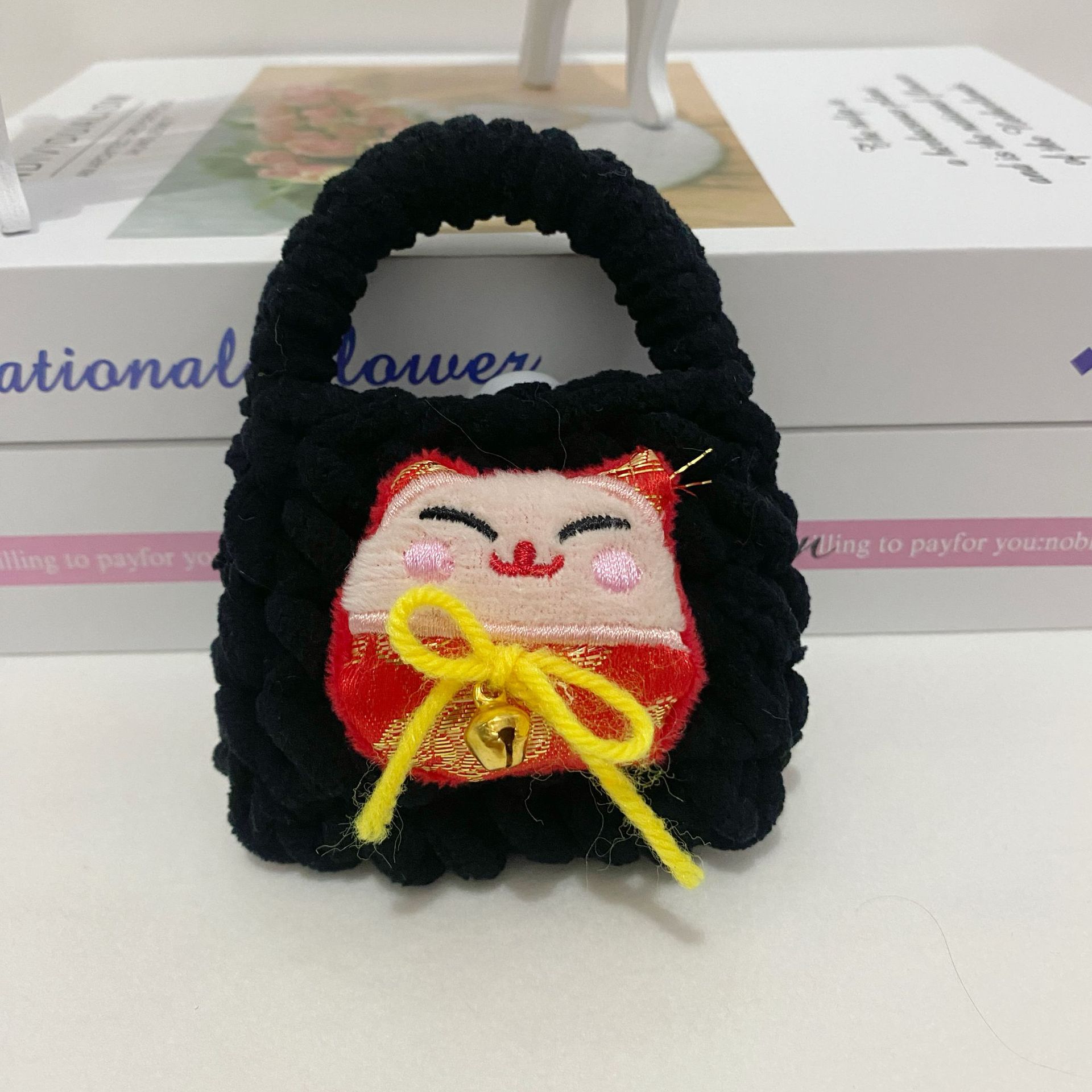 Celebración de Año Nuevo gran león rojo despertar dragón muñeca de peluche dibujos animados tejido a mano bolsas de auriculares Bluetooth bolsas de cambio al por mayor