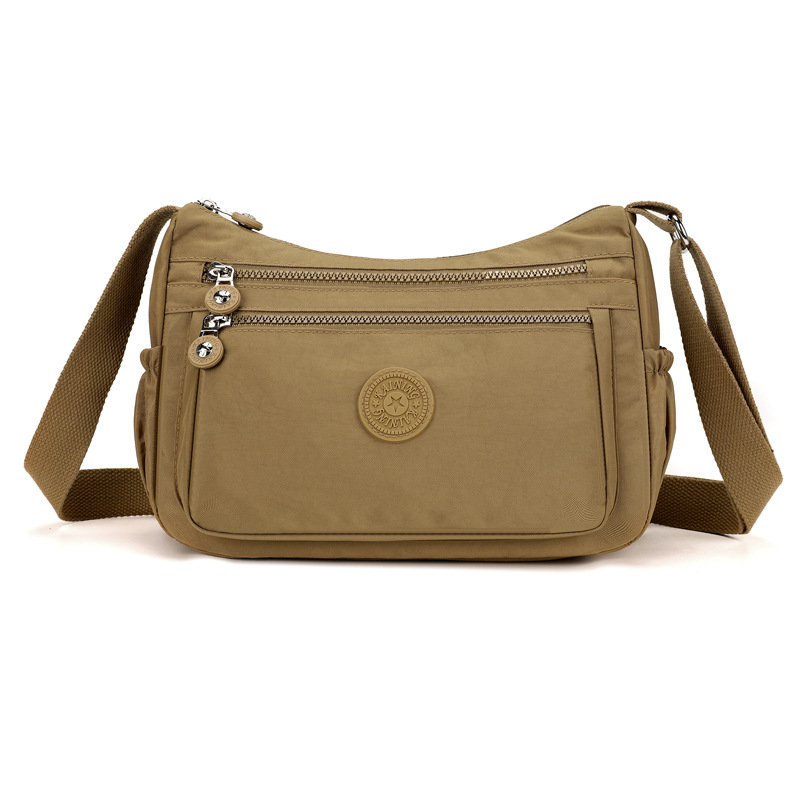 Bolsos bolsos para madres de mediana edad y ancianas 2024 nuevo bolso de mensajero de un solo hombro de tela de nailon bolso de bola de masa casual de viaje bolso de mujer