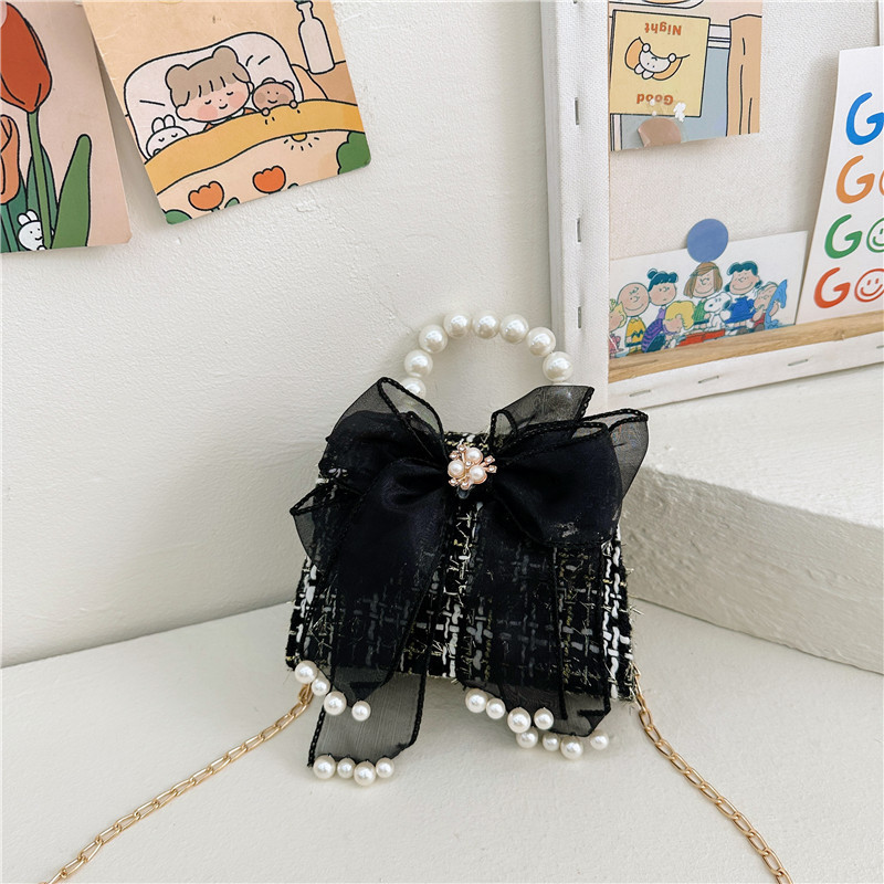 Bolsos de moda de moda para niños, arco de arco, nuevo bolso, cambio de chicas, mochila transfronteriza