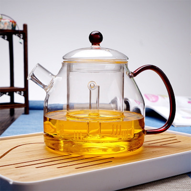 Fábrica mayorista de tetera de vidrio de alto borosilicato puede cocinar tetera de cerámica eléctrica tetera de té casera tetera de té de flores de té