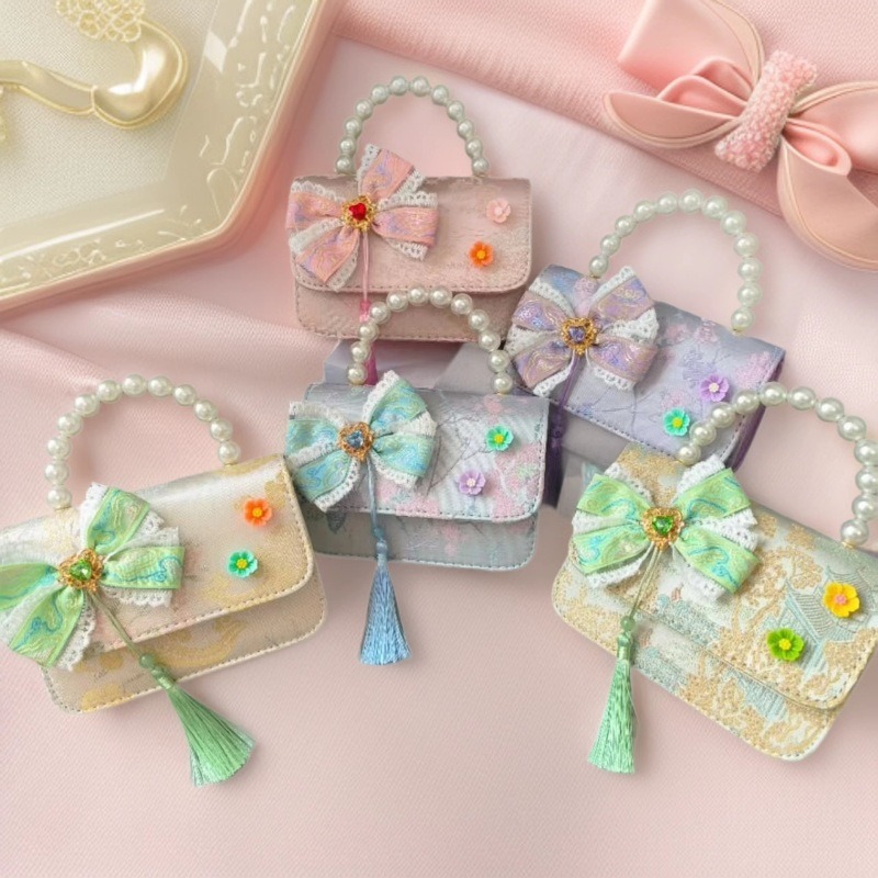 Bolsa portátil de la princesa de perlas estilo nacional arco de hombro bolso de cadena bolso pequeño bolso de cambio de Año Nuevo