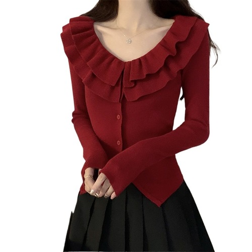 French-style ruffled V-neck New Year's red knitted cardigan for women—autumn/winter, slim-fit, high-end, elegant, and thick sweater coat