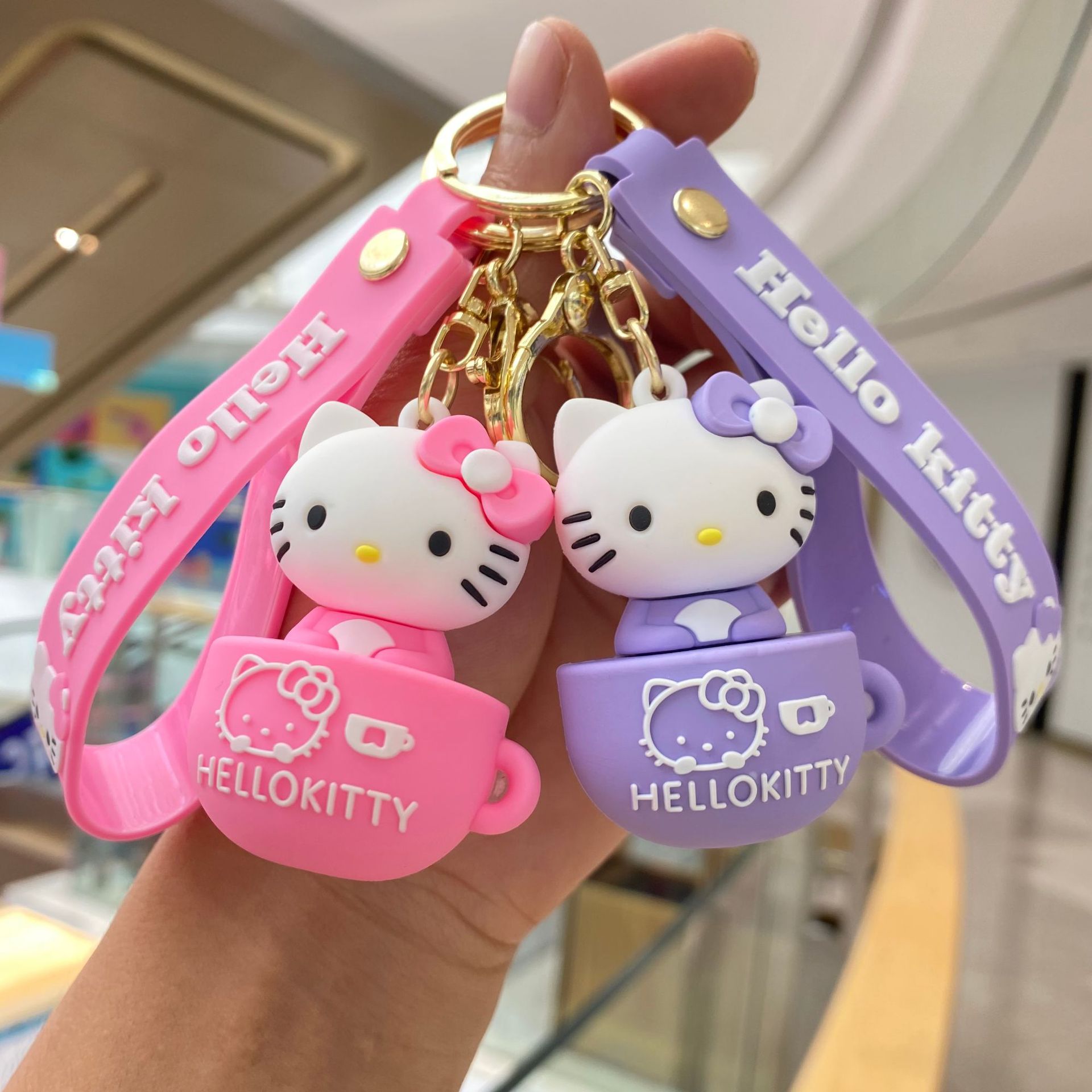 Dibujos Animados Sanrio KT gato llavero lindo PVC muñeca coche bolsa colgante bebé captura máquina pequeño regalo al por mayor
