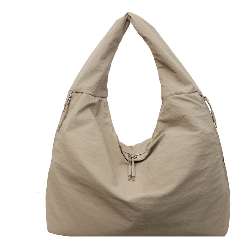 Bolsa de brazo de tela de nylon transfronteriza para mujeres 2025, nueva bolsa de hombro casual simple, bolsa de torneo casual universal