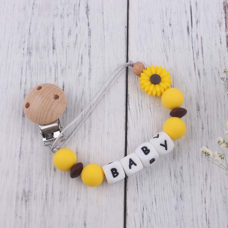 Nuevo bebé suministros de dibujos animados Margarita silicona mordedor creativo DIY nombre mordedura pegamento molar pezón cadena