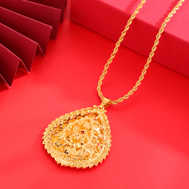 Sand Gold hombres y mujeres gota de agua colgante flores como brocado joyería hueca estilo nacional todo fósforo accesorios de temperamento suministro directo de fábrica