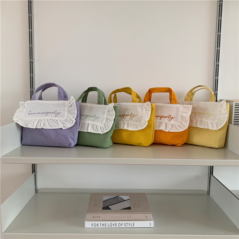1441 Japanese and Korean chic Sweet ruffled bento Bag, Fresh embroidered hand-held small cloth bag, girl student bag wholesale Application Scenario