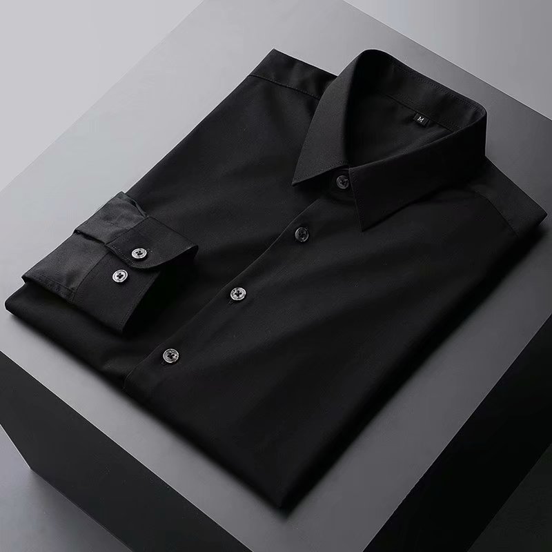 Camisa de manga larga de color sólido estilo coreano de los hombres de Moda Ropa superior casual diseño sentido ins marca de moda camisa suelta y guapo