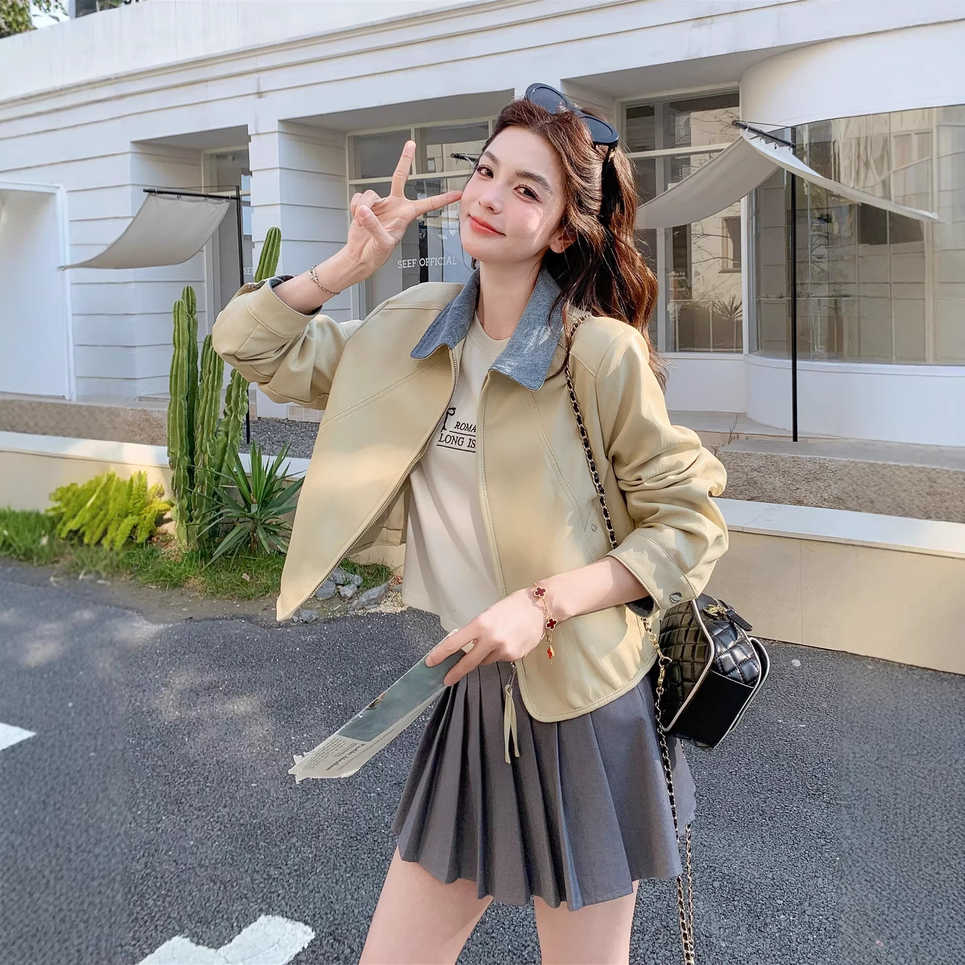 Korean style color-blocked lapel short leather jacket for women, spring and autumn 2026 new style, super popular petite jacket top
